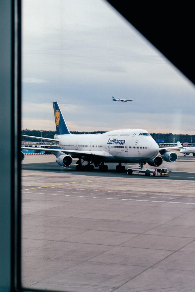 A large jetliner sitting on top of an airport tarmac